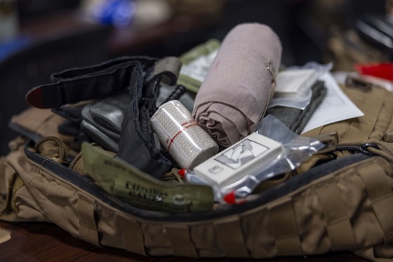 First aid kit with bandage and emergency supplies packed for response training