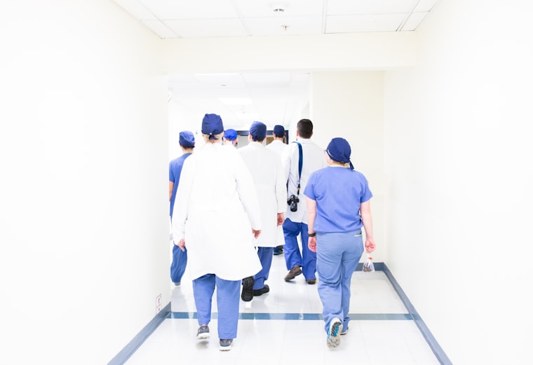 Medical team walking down a hospital hallway